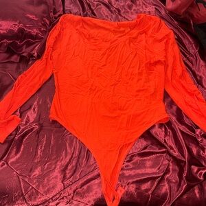 Orange body suit